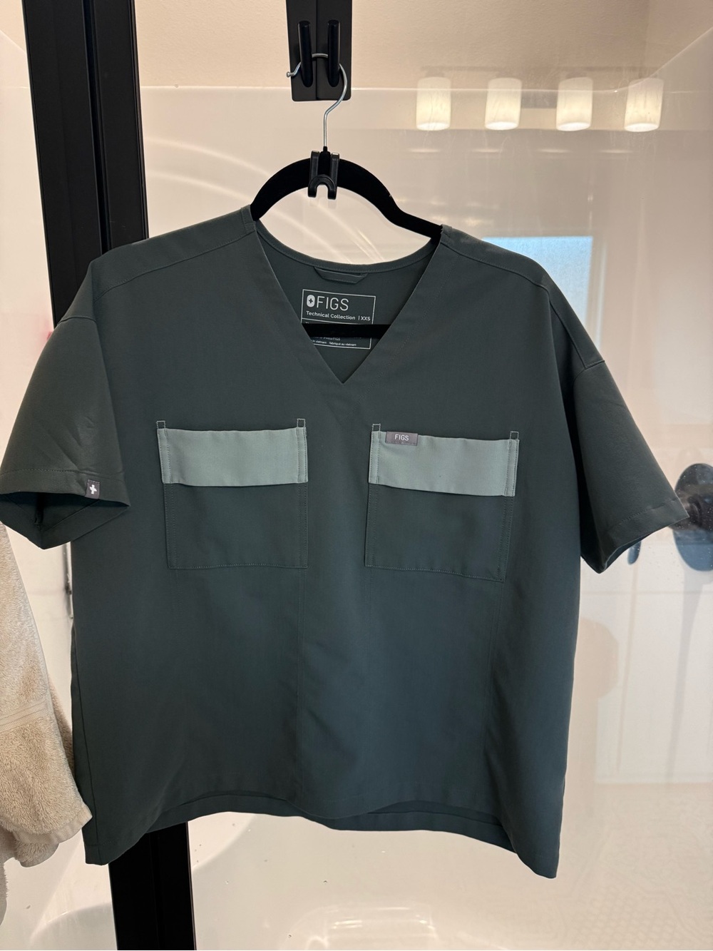 Figs Women's V-Neck Short Sleeve Top in Forest Green with Sage Pockets